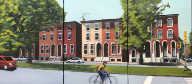 Row houses and bicyclist