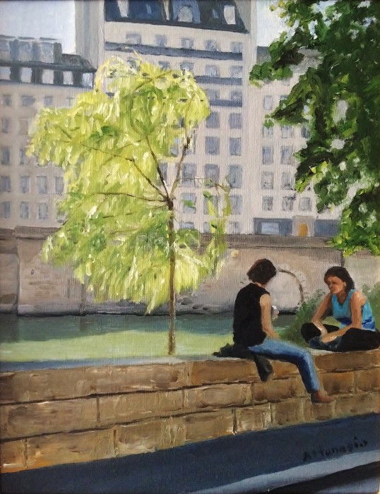 Figures seated on wall along the Seine, Paris