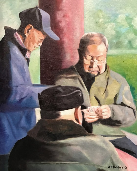 Elderly Chinese men playing cards in Beijing